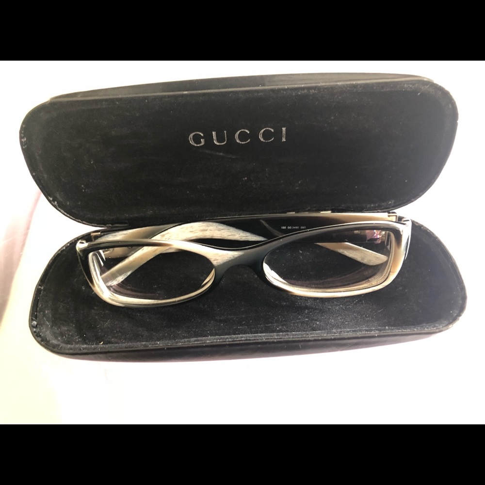 Gucci black/white Eyeglasses with original case.